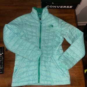 The North Face girls puffer jacket.